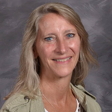 Kathy Kuipers smiling at the camera.
