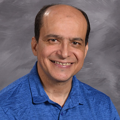 Michael Rodriguez smiling at the camera