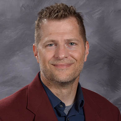 Greg Schemper smiling at the camera