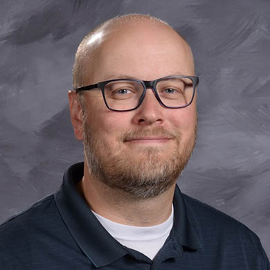 Andrew Kleyn smiling at the camera