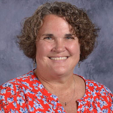 Kim Mast smiling at the camera